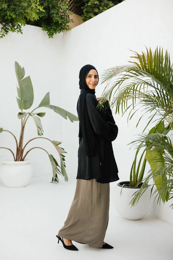 Black raglan crunched silk blouse with belt