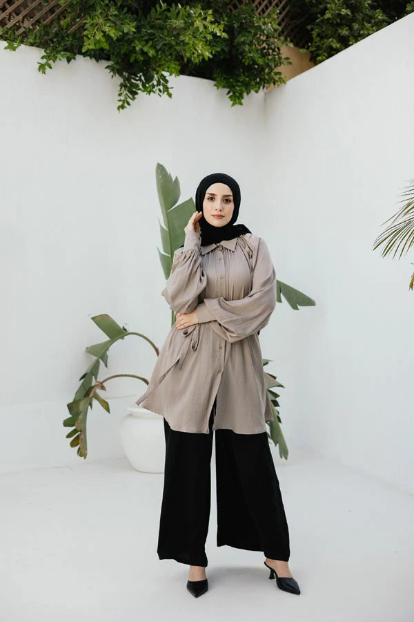 Beige raglan crunched silk blouse with belt .