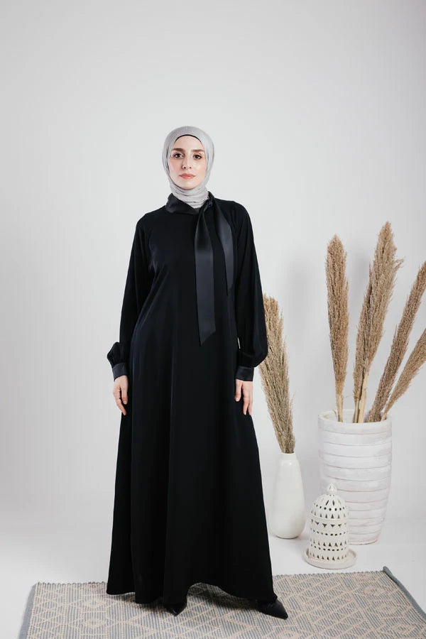 silky abaya with satin ribbon on the neck.
