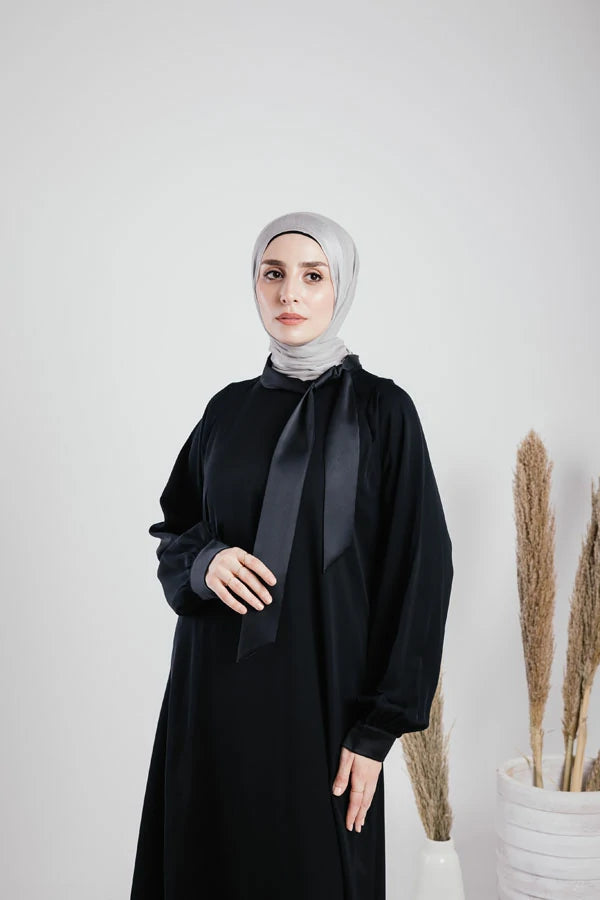 silky abaya with satin ribbon on the neck.