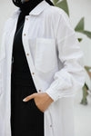 White poplin shirt with beige piping on pockets.