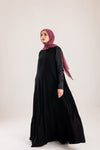 Sun rays crepe abaya with satin sleeves.
