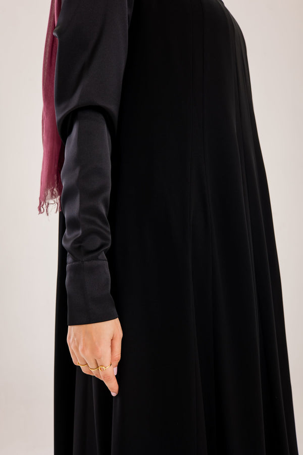 Sun rays crepe abaya with satin sleeves.