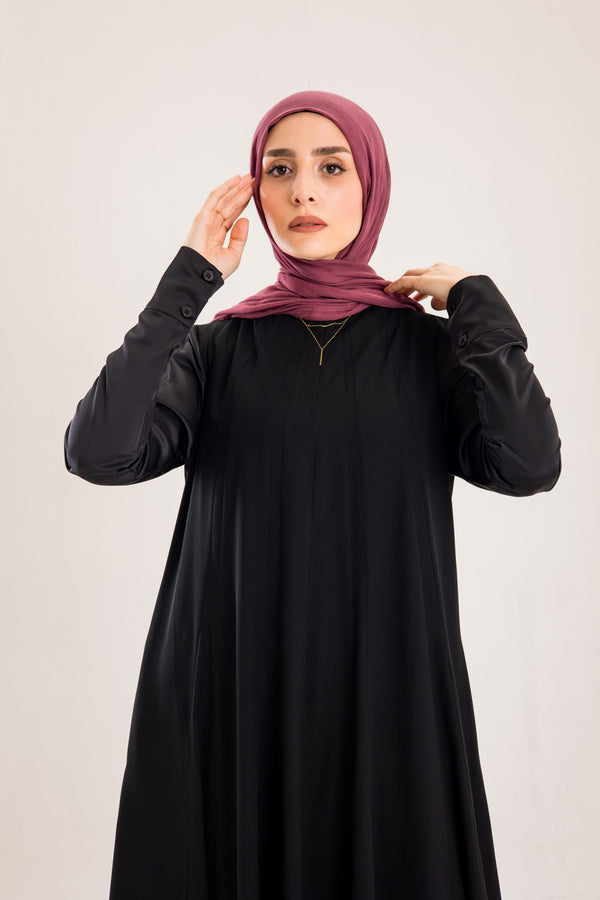 Sun rays crepe abaya with satin sleeves.