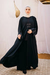 Cloche silk abaya with satin belts on sleeves and chest.