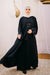 Cloche silk abaya with satin belts on sleeves and chest.
