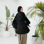 Black raglan crunched silk blouse with belt